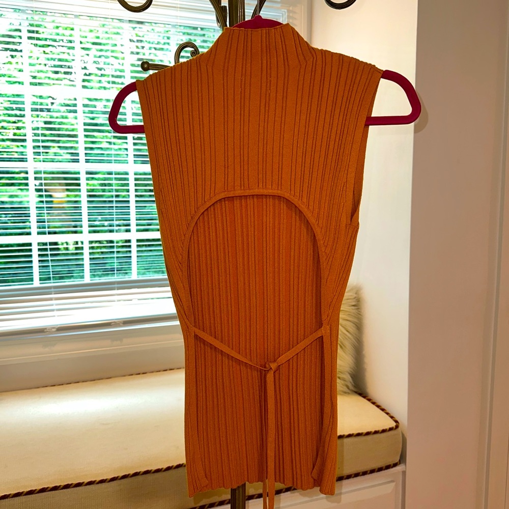 Nordstrom high neck open back long line top. Size M